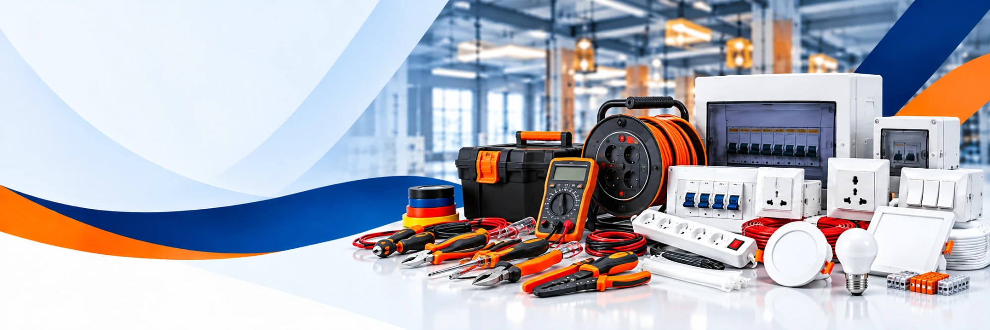 Electrician hand tools, a cable reel, multimeter, distribution board, switches, sockets and LED lights arranged on a white counter